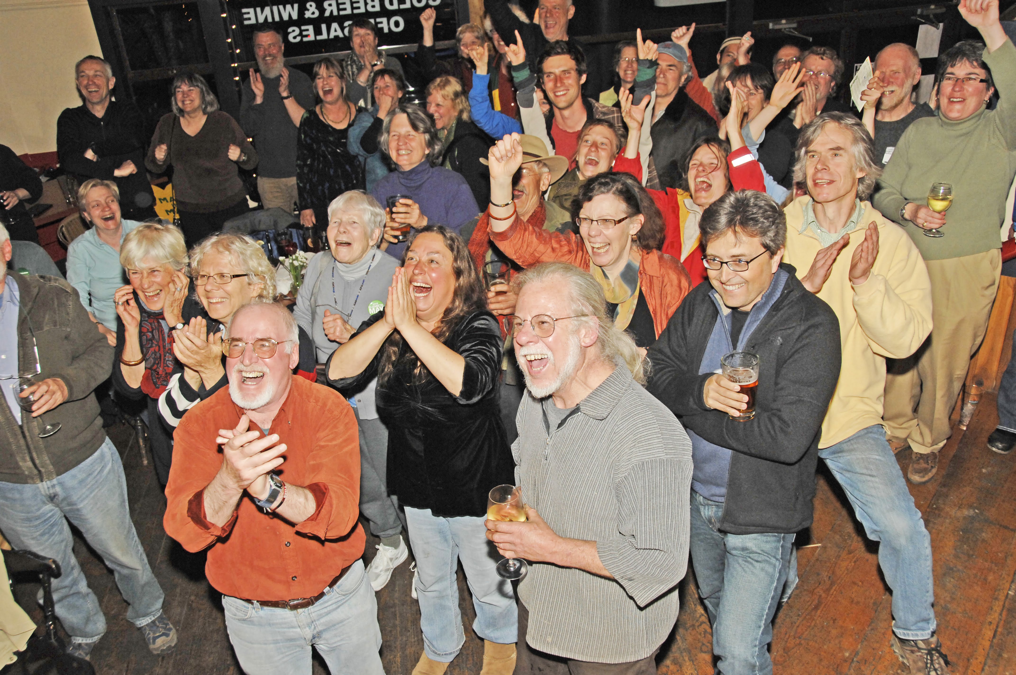 Euphoric Greens at Moby's Pub on Salt Spring Island react as Elizabeth is declared victorious over Conservative Cabinet member Gary Lunn.